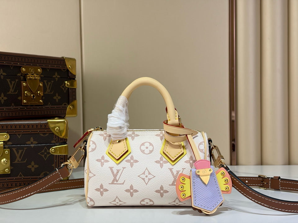 Mini Monogram Canvas Handbag with Bird Charm